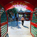 Entering a Japanese temple through round door