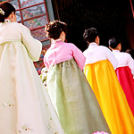Korean women in bright dresses
